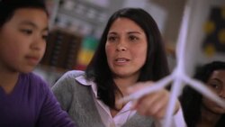 Teacher explains turbine to students Stock Footage