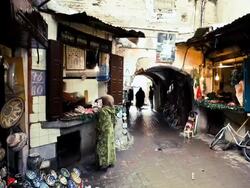 MS T/L Fish shop and various shops in market place / Marrakech, Morocco Stock Footage