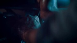 Man in motorcycle workshop building a bike Stock Footage