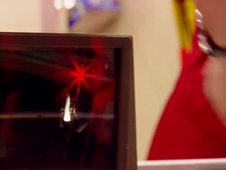 CU Shot of hand passing on products in front of laser at checkout / Minneapolis, Minnesota, United States Stock Footage