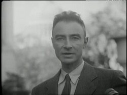 Scientist J. Robert Oppenheimer speaks about atomic bombs at the Capitol Building in Washington, DC. News Clip