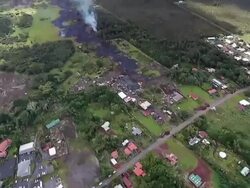 AERIAL: Homes In Pahoa, Hawaii Threatened By Lava Flow From Kilauea Volcano Stock Footage