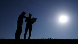 Silhouette of man and woman typing laptop on daylight time , 4k(UHD) Stock Footage