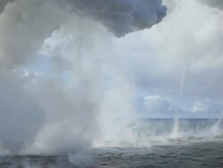 WS View of Volcanic steam cloud and twister drifting to ocean / Kalapana, Hawaii, The Big Island, USA Stock Footage