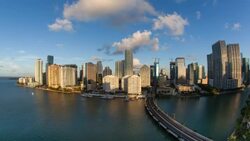 View from Brickell Key, a small island covered in apartment towers, towards the Miami skyline, Miami, Florida, USA - Time lapse Stock Footage