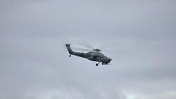 Combat helicopter flying in the sky Stock Footage