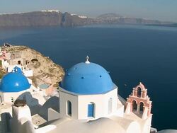 WS View of village Oia with church and Ocean / Santorini, Cyclades, Greece Stock Footage