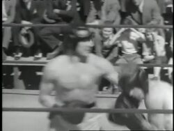 Max Baer trains with a sparring partner in the ring before a fight against James J. Braddock. Stock Footage