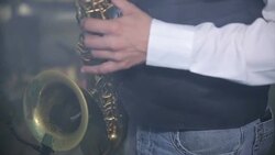 playing the saxophone Stock Footage
