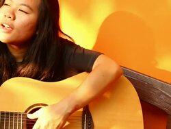 Guitar Playing Young woman Stock Footage