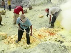 MS Miners working on the sulfur extraction at Ijen volcano crater / Ijen, Java, Indonesia Stock Footage