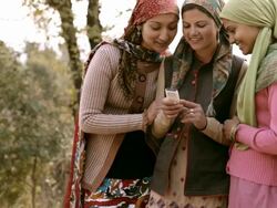 People of Himachal Pradesh: Beautiful young women using mobile phone Stock Footage