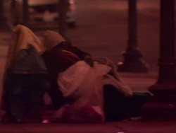 Homeless people in the cold on a winter's night News Clip