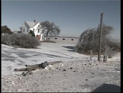 Heavy snowfalls across Midwest bring down power lines, block roads News Clip