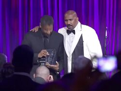 Denzel Washington and Steve Harvey at the Steve Harvey Hosts NY Gala Benefiting Steve Harvey Foundation Stock Footage