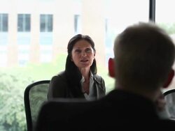 MS PAN mature businesswoman and businessman in discussion in conference room/Seattle, Washington, USA Stock Footage