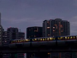 Monorail passing at night Stock Footage