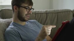 Digital tablet, young man 20s Stock Footage