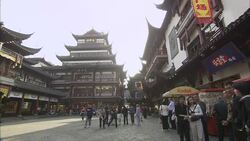 Pedestrians stroll through Ju Yuan Market in Shanghai, China. Stock Footage