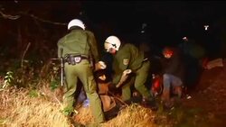 Police remove protesters' barricades; police pull protesters off rails News Clip