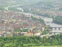 WS AERIAL PAN View of houses, church and bridges in Capital / Prague, Czech Republic Stock Footage