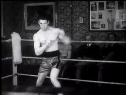 First snapshot is British champion Len Harvey in training at Windsor for fight with Petersen. News Clip
