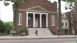 Traffic passes the Gettysburg Courthouse in Gettysburg, Pennsylvania. Stock Footage