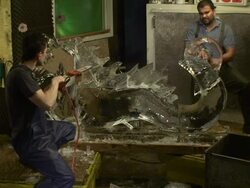 Artists carve a dragon ice sculpture. Stock Footage