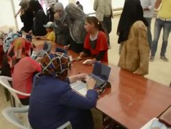 Zaatari refugee camp processing IDs Stock Footage