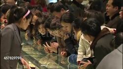 Busy gold jewellery shop in Beijing News Clip