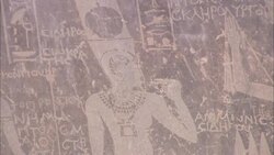 Ancient graffiti remain on a stone wall of the Serapis Temple in Sikait, Egypt. Stock Footage