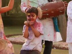 Indian family playing holi and dancing, Delhi, India Stock Footage