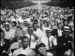 B/W August 28, 1963 crowd cheering at March on Washington / Washington Monument in background Stock Footage