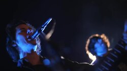 Low angle medium shot of lead singer at concert Stock Footage