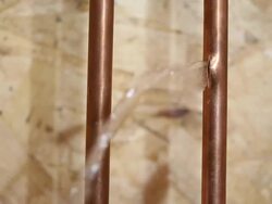 Frozen Cracked Copper Water Pipe Leaking into House Basement Stock Footage