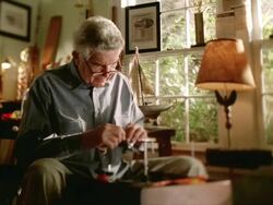  MS ZI Senior man carefully assembling fly for fly-fishing / Cleatwater, FLORIDA, USA Stock Footage
