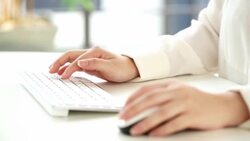 Hands of an office woman typing keyboard with credit card Stock Footage