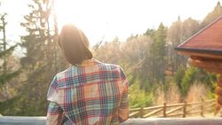 Cabin Retreat - Female looking at view. Stock Footage