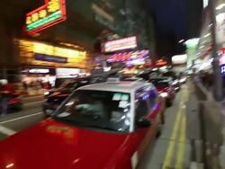 MS TD PAN View of Traffic signal with cars / Hong Kong, China Stock Footage