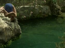 High Speed Man somersaulting into pool, Spain. (Individual frames may also be used as a still image. Each frame in its raw state is about 6MB or about 12MB as a 16 bit TIFF) Stock Footage