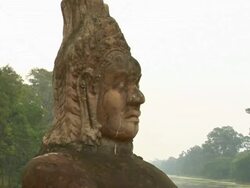 ZI Stone statues along entrance to Angkor Thom / Angkor, Cambodia Stock Footage