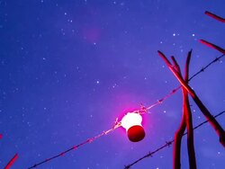 Barbed wire night and red lanterns Stock Footage