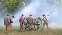 Confederate soldiers fire a canon during the Civil War. Stock Footage
