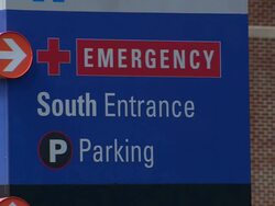 PAN Emergency entrance sign to hospital / Weymouth, Massachusetts, United States Stock Footage