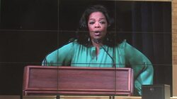 CLEAN: Beaming Oprah celebrates with first grads of S Africa school News Clip