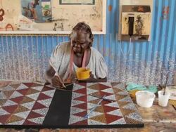 MS Frontal of woman painting abstract tiwi art / Northern Territory, Australia Stock Footage