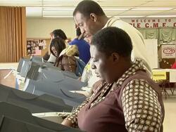 MS, People casting their votes at electronic voting machines, Toledo, Ohio, USA Stock Footage