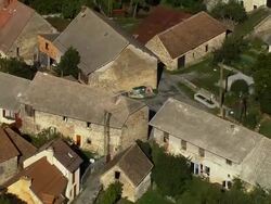 AERIAL WS View over old stone houses in French town / Rhone-Alpes, France Stock Footage