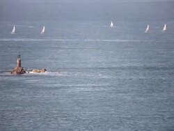 Lighthouse and Sailing boats Stock Footage
