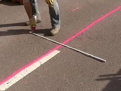 MS Shot of workmen working for measurement on street at sewage pipe / Saarburg, Rhineland Palatinate, Germany Stock Footage